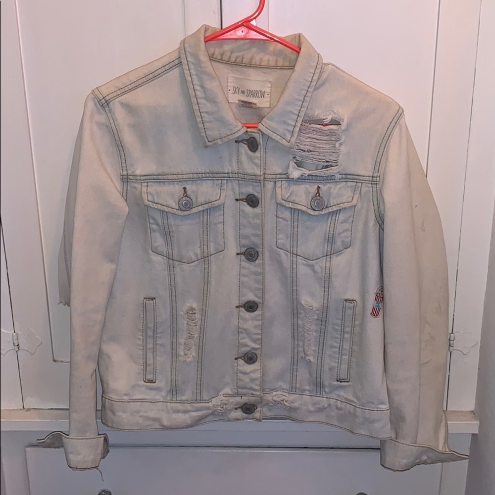 Light wash sky and sparrow  jean jacket